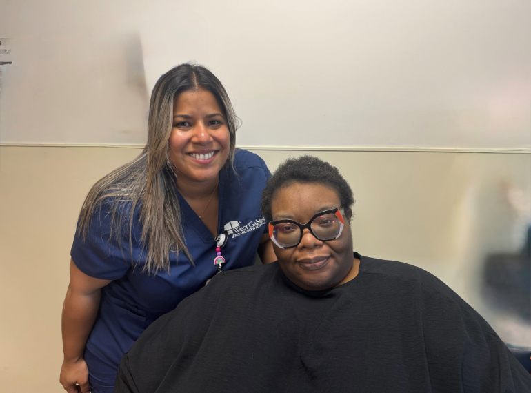 Evelyn and therapist smiling at camera