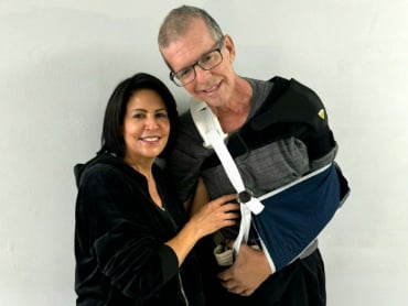Woman and man smiling at camera